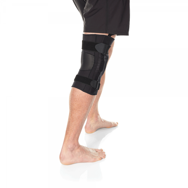 Compression knee brace with hinge