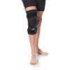 Hinged knee brace with swelling control